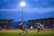 20 May 2024; Ronan Boyce of Derry City in action against Darragh Nugent and Trevor Clarke of Shamrock Rovers during the SSE Airtricity Men's Premier Division match between Shamrock Rovers and Derry City at Tallaght Stadium in Dublin. Photo by Ramsey Cardy/Sportsfile