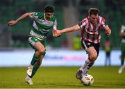 20 May 2024; Neil Farrugia of Shamrock Rovers in action against Cameron McJannet of Derry City during the SSE Airtricity Men's Premier Division match between Shamrock Rovers and Derry City at Tallaght Stadium in Dublin. Photo by Shauna Clinton/Sportsfile