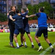 20 May 2024; Shelbourne staff including manager Damien Duff, left, celebrate their winning goal during the SSE Airtricity Men's Premier Division match between St Patrick's Athletic and Shelbourne at Richmond Park in Dublin. Photo by Stephen McCarthy/Sportsfile