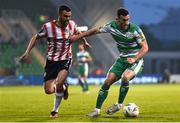 20 May 2024; Aaron Greene of Shamrock Rovers in action against Michael Duffy of Derry City during the SSE Airtricity Men's Premier Division match between Shamrock Rovers and Derry City at Tallaght Stadium in Dublin. Photo by Shauna Clinton/Sportsfile