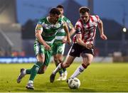 20 May 2024; Aaron Greene of Shamrock Rovers in action against Cameron McJannet of Derry City during the SSE Airtricity Men's Premier Division match between Shamrock Rovers and Derry City at Tallaght Stadium in Dublin. Photo by Shauna Clinton/Sportsfile