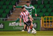 20 May 2024; Trevor Clarke of Shamrock Rovers in action against Adam O'Reilly of Derry City during the SSE Airtricity Men's Premier Division match between Shamrock Rovers and Derry City at Tallaght Stadium in Dublin. Photo by Shauna Clinton/Sportsfile