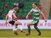 20 May 2024; Daniel Cleary of Shamrock Rovers in action against Michael Duffy of Derry City during the SSE Airtricity Men's Premier Division match between Shamrock Rovers and Derry City at Tallaght Stadium in Dublin. Photo by Shauna Clinton/Sportsfile