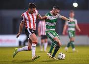 20 May 2024; Jack Byrne of Shamrock Rovers in action against Patrick McEleney of Derry City during the SSE Airtricity Men's Premier Division match between Shamrock Rovers and Derry City at Tallaght Stadium in Dublin. Photo by Shauna Clinton/Sportsfile