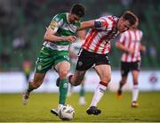 20 May 2024; Neil Farrugia of Shamrock Rovers in action against Cameron McJannet of Derry City during the SSE Airtricity Men's Premier Division match between Shamrock Rovers and Derry City at Tallaght Stadium in Dublin. Photo by Shauna Clinton/Sportsfile