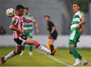 20 May 2024; Graham Burke of Shamrock Rovers in action against Michael Duffy of Derry City during the SSE Airtricity Men's Premier Division match between Shamrock Rovers and Derry City at Tallaght Stadium in Dublin. Photo by Shauna Clinton/Sportsfile