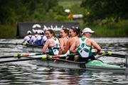 21 May 2024; The Ireland women's four team, from left, Emily Hegarty, Natalie Long, Eimear Lambe, and Imogen Magner celebrate after winning the Women's Four Final during the Final Olympic Qualification Regatta to qualify for the Paris 2024 Olympic Games at Lucerne in Switzerland. Photo by Clara O'Brien/Sportsfile