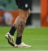 21 May 2024; A view of the tattoos on the legs of Gianluca Scamacca during the Atalanta BC training session ahead of the UEFA Europa League 2023/24 final match between Atalanta BC and Bayer 04 Leverkusen at Dublin Arena in Dublin, Ireland. Photo by Brendan Moran/Sportsfile
