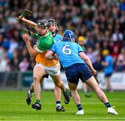22 May 2024; Cathal King of Offaly is tackled by Conor Dolan of Dublin during the oneills.com Leinster GAA Hurling U20 Championship final match between Dublin and Offaly at Laois Hire O'Moore Park in Portlaoise, Laois. Photo by Ray McManus/Sportsfile