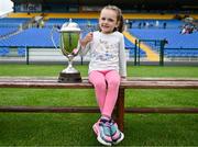 24 May 2024; Sophia Lynch, age 6, from Ballinameen, Roscommon, with The Tom Kilcoyne Cup before the Connacht GAA Football Minor Championship final match between Mayo and Roscommon at Dr Hyde Park in Roscommon. Photo by Stephen Marken/Sportsfile