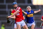 24 May 2024; Diarmuid Healy of Cork in action against Ben Currivan of Tipperary during the oneills.com Munster GAA U20 Hurling Championship final match between Tipperary and Cork at TUS Gaelic Grounds in Limerick. Photo by Ben McShane/Sportsfile