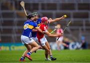 24 May 2024; Hugh O'Connor of Cork is tackled by Mason Cawley, left, and Sam O'Farrell of Tipperary during the oneills.com Munster GAA U20 Hurling Championship final match between Tipperary and Cork at TUS Gaelic Grounds in Limerick. Photo by Ben McShane/Sportsfile