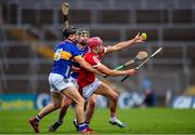 24 May 2024; Hugh O'Connor of Cork is tackled by Mason Cawley, left, and Sam O'Farrell of Tipperary during the oneills.com Munster GAA U20 Hurling Championship final match between Tipperary and Cork at TUS Gaelic Grounds in Limerick. Photo by Ben McShane/Sportsfile