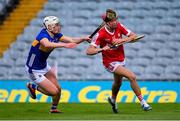 24 May 2024; Hugh O'Connor of Cork in action against Aaron O'Halloran of Tipperary during the oneills.com Munster GAA U20 Hurling Championship final match between Tipperary and Cork at TUS Gaelic Grounds in Limerick. Photo by Ben McShane/Sportsfile