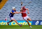 24 May 2024; Hugh O'Connor of Cork in action against Aaron O'Halloran of Tipperary during the oneills.com Munster GAA U20 Hurling Championship final match between Tipperary and Cork at TUS Gaelic Grounds in Limerick. Photo by Ben McShane/Sportsfile