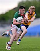 24 May 2024; Andrew Quinn of Mayo in action against Declan Kennedy of Roscommon during the Connacht GAA Football Minor Championship final match between Mayo and Roscommon at Dr Hyde Park in Roscommon. Photo by Stephen Marken/Sportsfile
