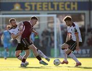 24 May 2024; Edward McCarthy of Galway United in action against Dundalk players, Paul Doyle, left, and Archie Davies during the SSE Airtricity Men's Premier Division match between Galway United and Dundalk at Eamonn Deacy Park in Galway. Photo by Michael P Ryan/Sportsfile