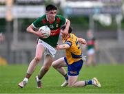 24 May 2024; Andrew Quinn of Mayo in action against Eoin Collins of Roscommon during the Connacht GAA Football Minor Championship final match between Mayo and Roscommon at Dr Hyde Park in Roscommon. Photo by Stephen Marken/Sportsfile