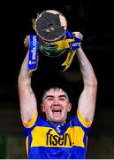 24 May 2024; Tipperary captain Ben Currivan lifts the cup after the oneills.com Munster GAA U20 Hurling Championship final match between Tipperary and Cork at TUS Gaelic Grounds in Limerick. Photo by Ben McShane/Sportsfile