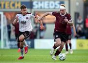 24 May 2024; Stephen Walsh of Galway United in action against Archie Davies of Dundalk during the SSE Airtricity Men's Premier Division match between Galway United and Dundalk at Eamonn Deacy Park in Galway. Photo by Michael P Ryan/Sportsfile