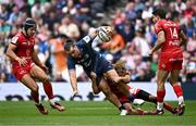 25 May 2024; James Lowe of Leinster is tackled by Paul Costes of Toulouse during the Investec Champions Cup final between Leinster and Toulouse at the Tottenham Hotspur Stadium in London, England. Photo by Harry Murphy/Sportsfile