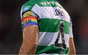24 May 2024; A detailed view of the captain's armband worn by Roberto Lopes of Shamrock Rovers, in the LGBT colours, a part of SSE Airtricity's LGBT Ireland Football takeover initiative, during the SSE Airtricity Men's Premier Division match between Shamrock Rovers and Shelbourne at Tallaght Stadium in Dublin. Photo by Stephen McCarthy/Sportsfile