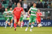 24 May 2024; Graham Burke of Shamrock Rovers in action against JJ Lunney of Shelbourne during the SSE Airtricity Men's Premier Division match between Shamrock Rovers and Shelbourne at Tallaght Stadium in Dublin. Photo by Stephen McCarthy/Sportsfile