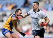 25 May 2024; Dublin goalkeeper Stephen Cluxton in action against Donie Smith of Roscommon during the GAA Football All-Ireland Senior Championship Round 1 match between Dublin and Roscommon at Croke Park in Dublin. Photo by Stephen Marken/Sportsfile