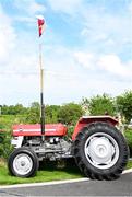 25 May 2024; A tractor with a Louth flag outside Inniskeen ahead of the GAA Football All-Ireland Senior Championship Round 1 match between Louth and Meath at Grattan Park in Inniskeen, Monaghan. Photo by Daire Brennan/Sportsfile