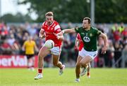 25 May 2024; Conor Grimes of Louth in action against Ronan Jones of Meath during the GAA Football All-Ireland Senior Championship Round 1 match between Louth and Meath at Grattan Park in Inniskeen, Monaghan. Photo by Daire Brennan/Sportsfile