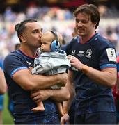 25 May 2024; James Lowe of Leinster with son Nico and team-mate Ryan Baird during the Investec Champions Cup final between Leinster and Toulouse at the Tottenham Hotspur Stadium in London, England. Photo by Harry Murphy/Sportsfile