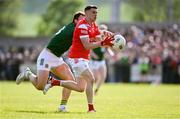 25 May 2024; Conall McKeever of Louth in action against Ronan Jones of Meath during the GAA Football All-Ireland Senior Championship Round 1 match between Louth and Meath at Grattan Park in Inniskeen, Monaghan. Photo by Daire Brennan/Sportsfile