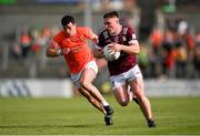 25 May 2024; Conor Dillon of Westmeath in action against Conor O'Neill of Armagh during the GAA Football All-Ireland Senior Championship Round 1 match between Armagh and Westmeath at the Box It Athletic Grounds in Armagh. Photo by Ben McShane/Sportsfile