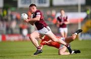 25 May 2024; Conor Dillon of Westmeath in action against Conor O'Neill of Armagh during the GAA Football All-Ireland Senior Championship Round 1 match between Armagh and Westmeath at the Box It Athletic Grounds in Armagh. Photo by Ben McShane/Sportsfile