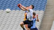 25 May 2024; Dublin goalkeeper Stephen Cluxton  punches the ball clear of team mate Michael Fitzsimons and Conor Cox of Roscommon during the GAA Football All-Ireland Senior Championship Round 1 match between Dublin and Roscommon at Croke Park in Dublin. Photo by Ray McManus/Sportsfile