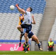 25 May 2024; Dublin goalkeeper Stephen Cluxton  punches the ball clear of team mate Michael Fitzsimons and Conor Cox of Roscommon during the GAA Football All-Ireland Senior Championship Round 1 match between Dublin and Roscommon at Croke Park in Dublin. Photo by Ray McManus/Sportsfile