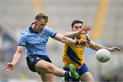 25 May 2024; Seán Bugler of Dublin in action against Ruaidhri Fallon of Roscommon during the GAA Football All-Ireland Senior Championship Round 1 match between Dublin and Roscommon at Croke Park in Dublin. Photo by Stephen Marken/Sportsfile