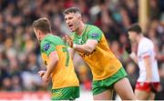 25 May 2024; Peadar Mogan, left, is congratulated by his Donegal team-mate Patrick McBrearty after scoring a second half point during the GAA Football All-Ireland Senior Championship Round 1 match between Donegal and Tyrone at MacCumhaill Park in Ballybofey, Donegal. Photo by Stephen McCarthy/Sportsfile