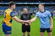 25 May 2024; Referee Derek O'Mahoney looks on as the two captains, Brian Stack of Roscommon and Con O'Callaghan of Dublin, shake hands before the GAA Football All-Ireland Senior Championship Round 1 match between Dublin and Roscommon at Croke Park in Dublin. Photo by Ray McManus/Sportsfile