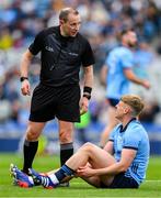 25 May 2024; Referee Derek O'Mahoney checks on the welfare of Cian Murphy of Dublin before he was forced to leave the pitch, injured, during the GAA Football All-Ireland Senior Championship Round 1 match between Dublin and Roscommon at Croke Park in Dublin. Photo by Ray McManus/Sportsfile