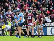 26 May 2024; Referee Colm Lyons shows a red card to David Burke of Galway during the Leinster GAA Hurling Senior Championship Round 5 match between Galway and Dublin at Pearse Stadium in Galway. Photo by Daire Brennan/Sportsfile