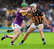 26 May 2024; Richie Lawlor of Wexford is tackled by Paddy Deegan of Kilkenny during the Leinster GAA Hurling Senior Championship Round 5 match between Kilkenny and Wexford at UPMC Nowlan Park in Kilkenny. Photo by Ray McManus/Sportsfile