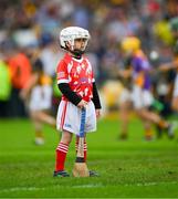 26 May 2024; Seven year old Dylan Clancy of the Young Ireland All Stars team awaits the start of the half time game during the Leinster GAA Hurling Senior Championship Round 5 match between Kilkenny and Wexford at UPMC Nowlan Park in Kilkenny. Photo by Ray McManus/Sportsfile