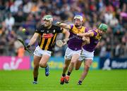 26 May 2024; Paddy Deegan of Kilkenny in action against Cathal Dunbar and Richie Lawlor of Wexford, right, during the Leinster GAA Hurling Senior Championship Round 5 match between Kilkenny and Wexford at UPMC Nowlan Park in Kilkenny. Photo by Ray McManus/Sportsfile