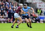 26 May 2024; Ronan Hayes of Dublin in action against Daithí Burke of Galway during the Leinster GAA Hurling Senior Championship Round 5 match between Galway and Dublin at Pearse Stadium in Galway. Photo by Daire Brennan/Sportsfile