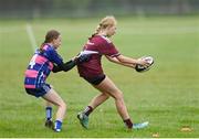 26 May 2024; Action during the X Rugby 7s U13 & U11 Girls match between Fethard-Killusty, Tipperary, and Multyfarnham, Westmeath, during day two of the multi-sports finals of the Cairn Community Games at Gormanston Park in Meath. Photo by Ben McShane/Sportsfile