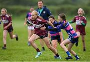 26 May 2024; Action during the X Rugby 7s U13 & U11 Girls match between Fethard-Killusty, Tipperary, and Multyfarnham, Westmeath, during day two of the multi-sports finals of the Cairn Community Games at Gormanston Park in Meath. Photo by Ben McShane/Sportsfile