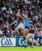 26 May 2024; Conor Cooney of Galway in action against Chris Crummey of Dublin during the Leinster GAA Hurling Senior Championship Round 5 match between Galway and Dublin at Pearse Stadium in Galway. Photo by Daire Brennan/Sportsfile