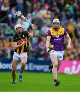 26 May 2024; Liam Ryan of Wexford races clear of Cian Kenny of Kilkenny during the Leinster GAA Hurling Senior Championship Round 5 match between Kilkenny and Wexford at UPMC Nowlan Park in Kilkenny. Photo by Ray McManus/Sportsfile