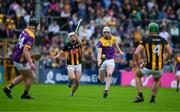 26 May 2024; Liam Ryan of Wexford races clear of Cian Kenny of Kilkenny during the Leinster GAA Hurling Senior Championship Round 5 match between Kilkenny and Wexford at UPMC Nowlan Park in Kilkenny. Photo by Ray McManus/Sportsfile